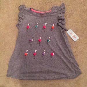 Flamingo shirt with pom-poms